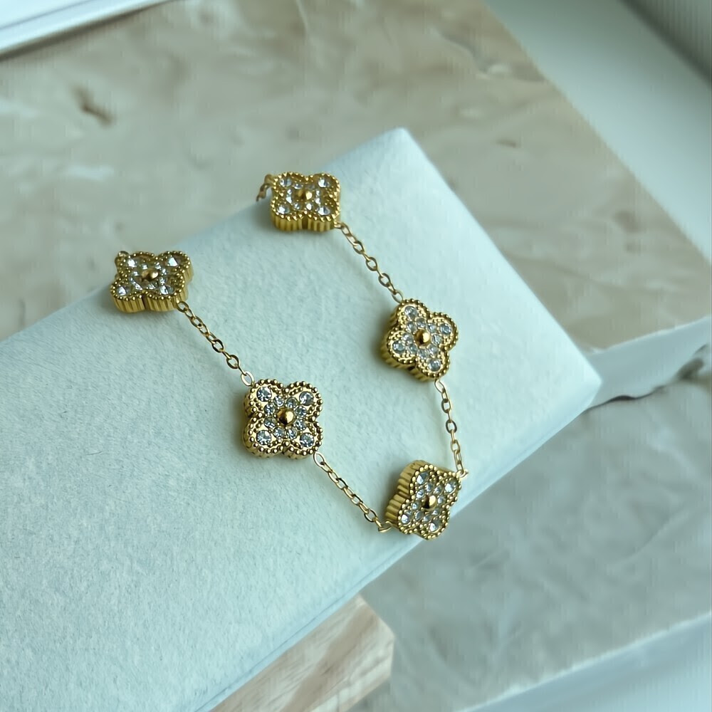 Pulseira trevo cravejado dupla face Dourado